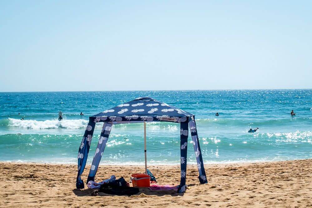 beach shelter set up near the shoreline on an Australian beach.