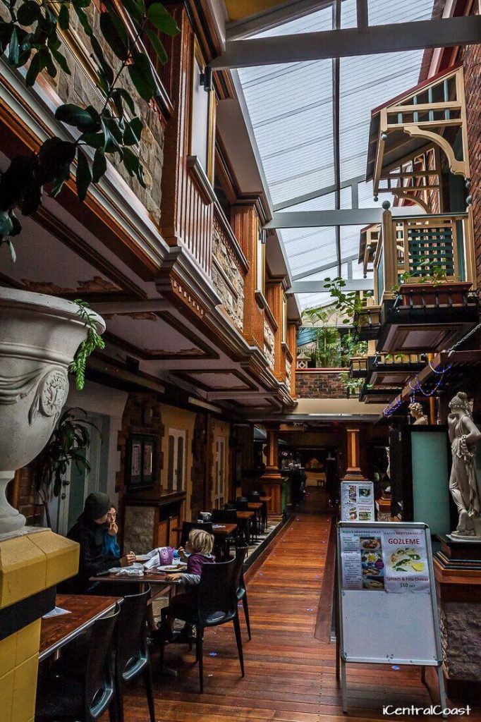 Indoor corridor with shops and stalls at Ettalong Markets