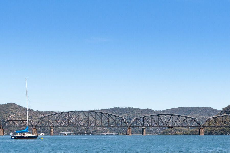 Hawkesbury River railway bridge with boats on the water, Central Coast NSW