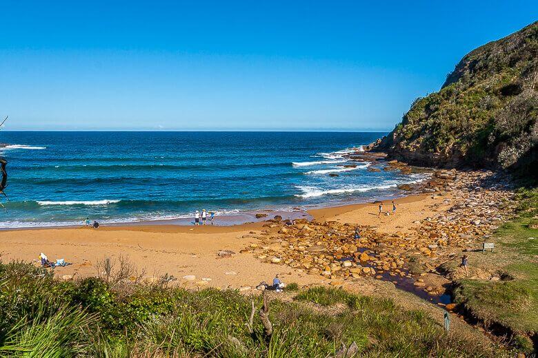 Sandy cove and rocky shoreline at Little Beach on the Central Coast