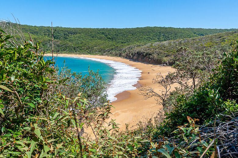 Secluded sandy shoreline at Maitland Bay on the Central Coast