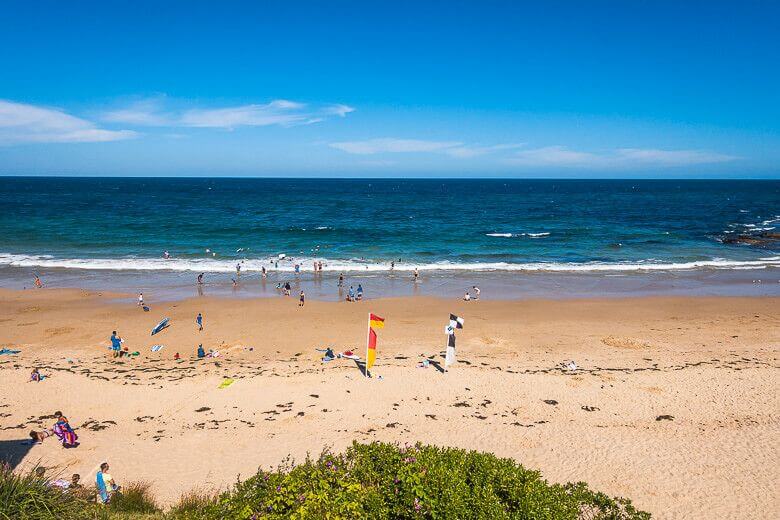 The Entrance Beach on the Central Coast with families and kids enjoying the shoreline