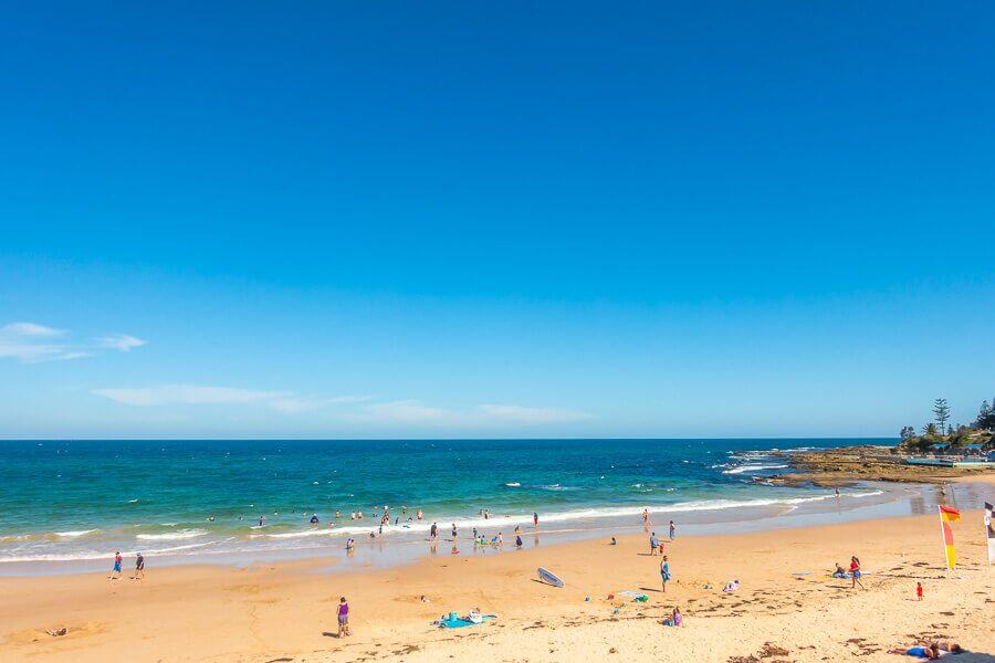 Beachgoers enjoying The Entrance Beach on the Central Coast