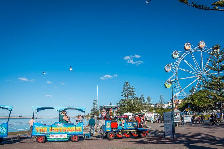 Mini Thomas-style train ride at The Entrance foreshore with kids enjoying a family attraction