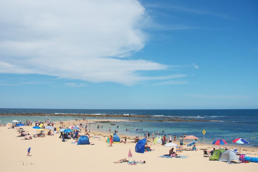 Families enjoying Toowoon Bay Beach on the Central Coast NSW near The Entrance