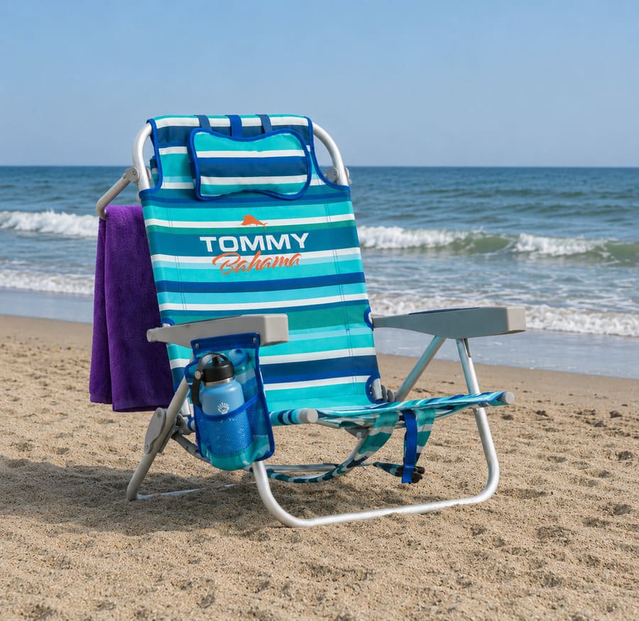 Tommy Bahama backpack beach chair with towel and drink holder on the sand