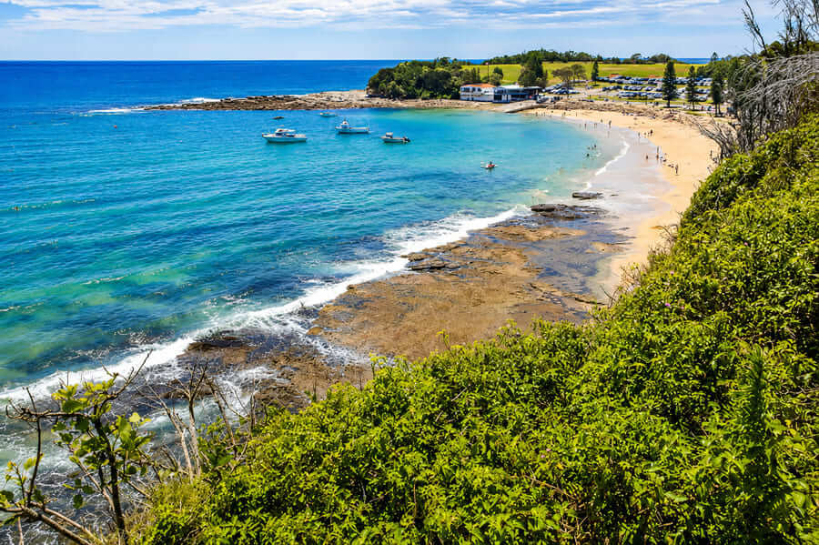 View across Terrigal Haven beach and rock platform from the coastal headland