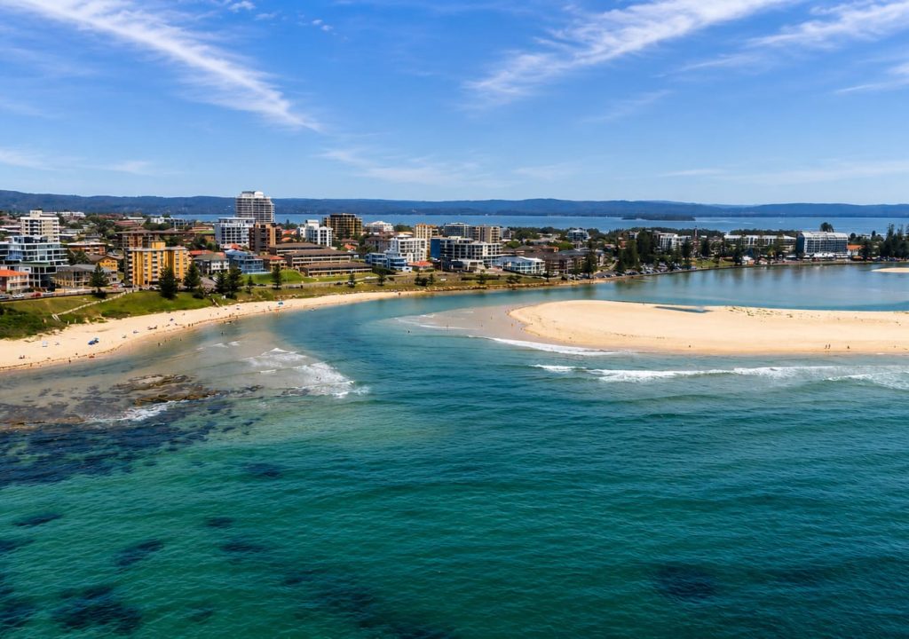 Aerial view of The Entrance channel, sand island and waterfront on the NSW Central Coast