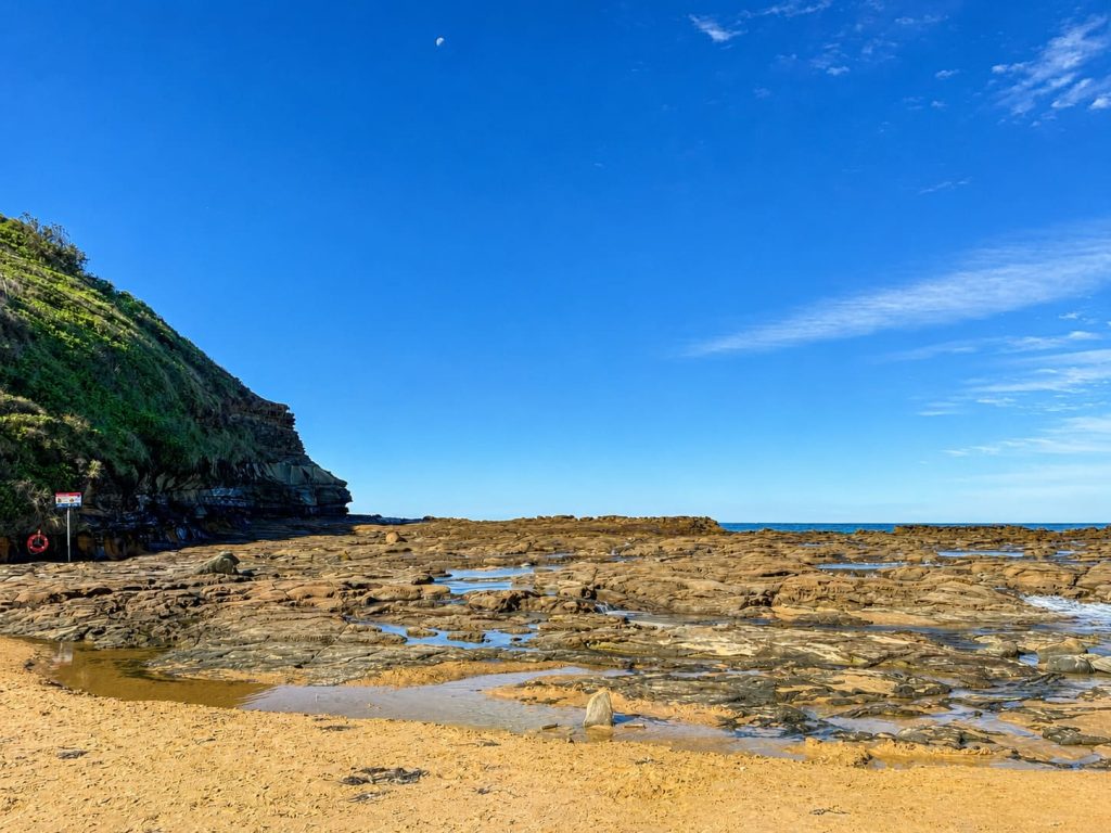 Rock platform and tidal pools at the southern end of North Avoca Beach on the Central Coast NSW.