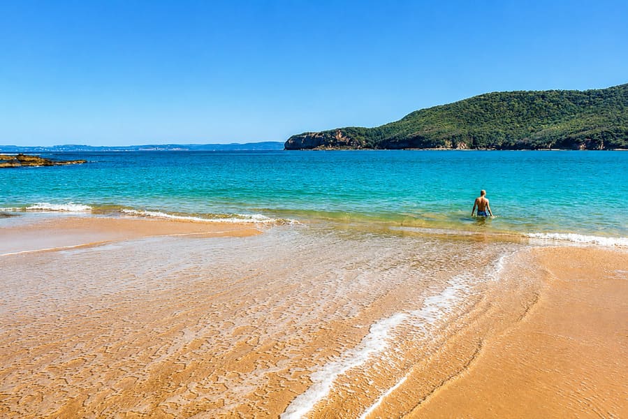 Swimmer in the clear water at Maitland Bay in Bouddi National Park.