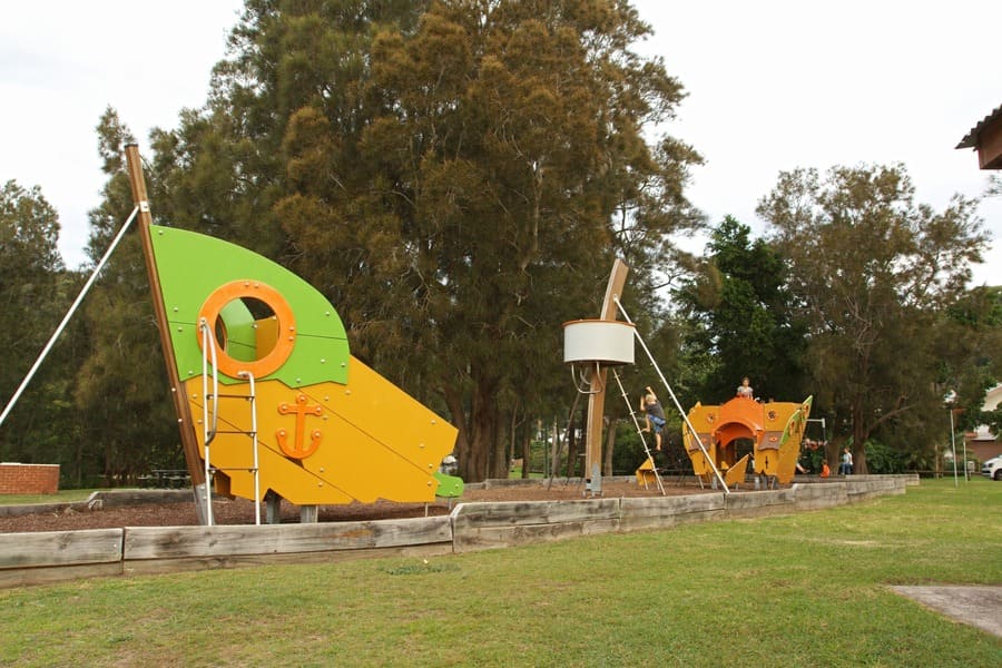 Children's playground at Pretty Beach with boat-themed play equipment