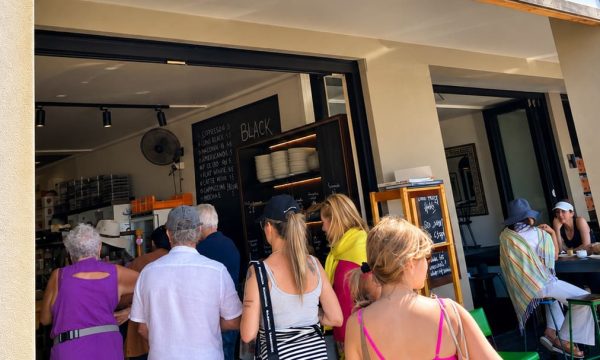 Customers ordering at Burnt Honey bakery and cafe in Copacabana