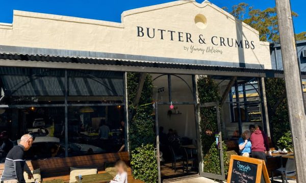 Exterior of Butter & Crumbs café in East Gosford with outdoor seating