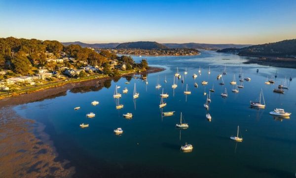 Boats moored on Brisbane Water at Hardys Bay