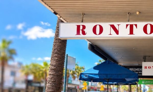 Ronto Cafe in Umina with outdoor footpath seating and Seven Miles Coffee umbrellas