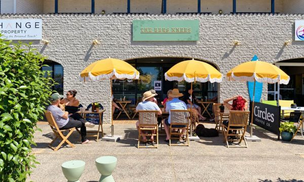 Outdoor seating at The Bees Knees cafe in Copacabana